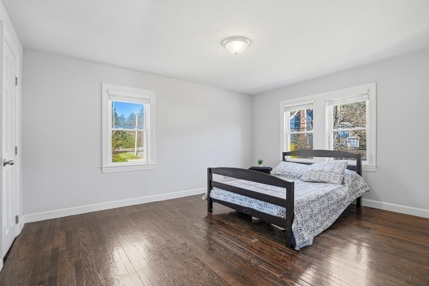 49 Grove Street Upton, MA 01568 - Photo 21 of 39 a bedroom with a bed and window