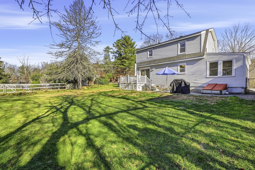 49 Grove Street Upton, MA 01568 - Photo 32 of 39 a front view of house with yard and seating area