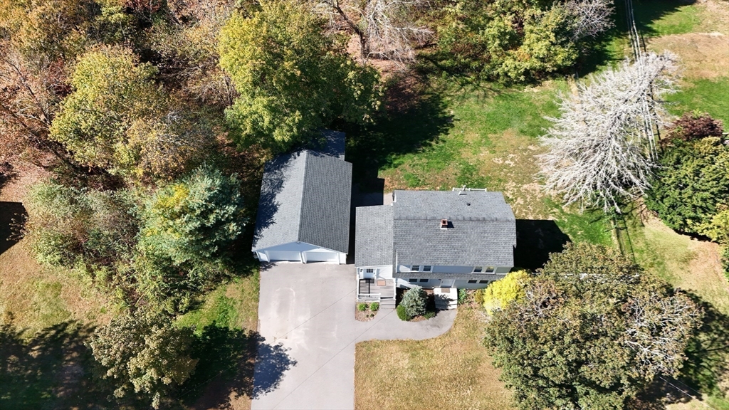 49 Grove Street Upton, MA 01568 - Photo 33 of 39 an aerial view of a house with yard and swimming pool