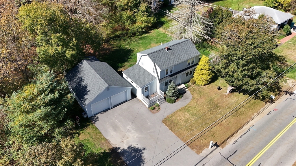 49 Grove Street Upton, MA 01568 - Photo 34 of 39 an aerial view of a house with a yard