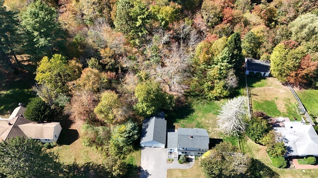 49 Grove Street Upton, MA 01568 - Photo 35 of 39 an aerial view of a house with a yard