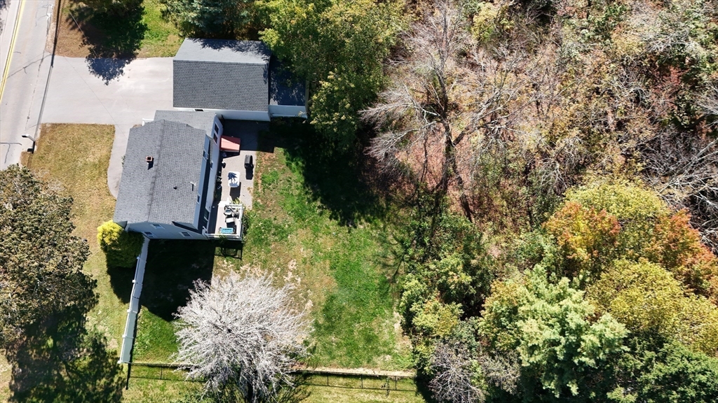 49 Grove Street Upton, MA 01568 - Photo 36 of 39 an aerial view of a house with a yard basket ball court and outdoor seating