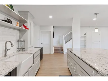 a view of kitchen and a window