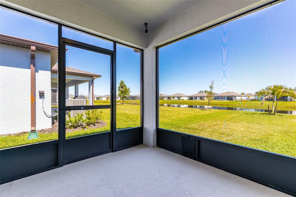 9256 Royal River Circle Parrish, FL 34219 - Photo 31 of 38 a view of an ocean with a floor to ceiling window