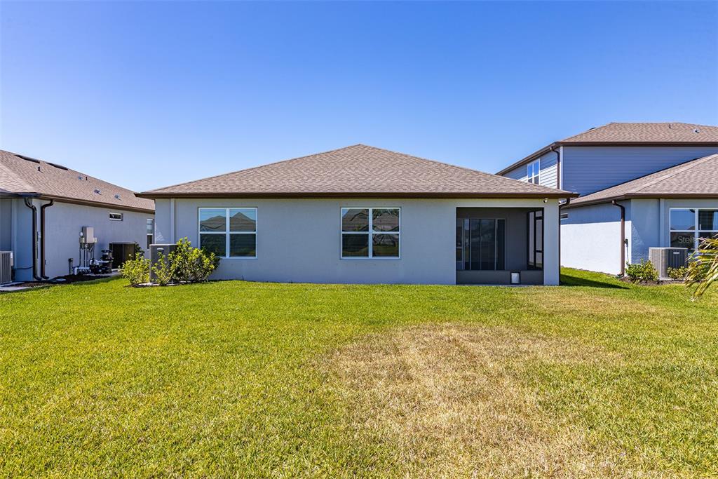 9256 Royal River Circle Parrish, FL 34219 - Photo 33 of 38 a house view with a garden space