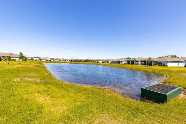 a view of a swimming pool and lake view