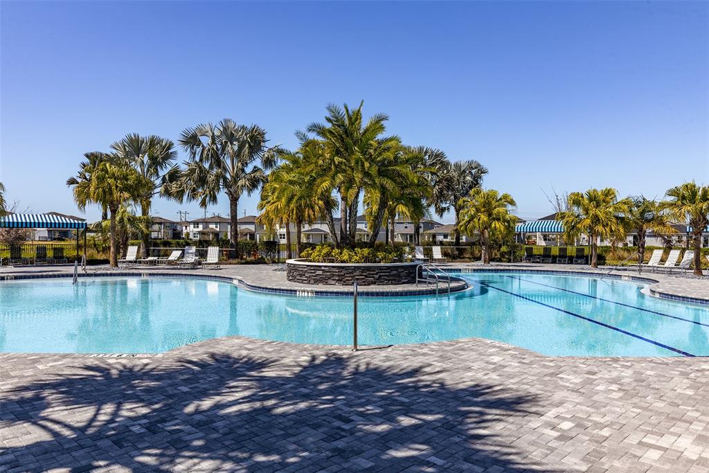 9256 Royal River Circle Parrish, FL 34219 - Photo 36 of 38 a view of swimming pool with outdoor seating and plants