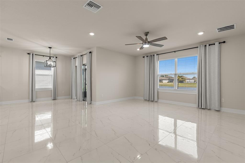 9256 Royal River Circle Parrish, FL 34219 - Photo 6 of 38 a view of an empty room with a kitchen