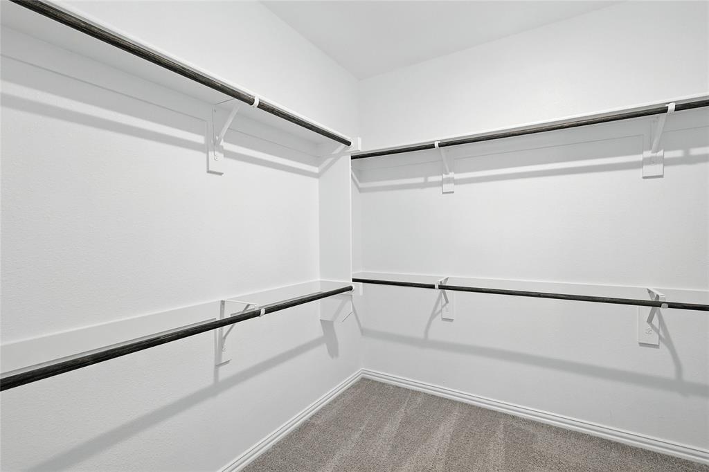 509 Hummingbird Lane Van Alstyne, TX 75495 - Photo 20 of 40 a view of a room with racks on the wall