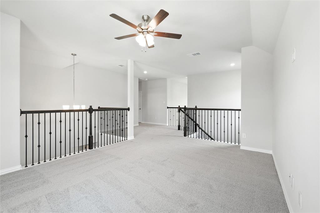 509 Hummingbird Lane Van Alstyne, TX 75495 - Photo 24 of 40 a view of a hallway with a window
