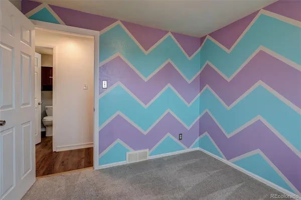 a room that has a bed and a couch