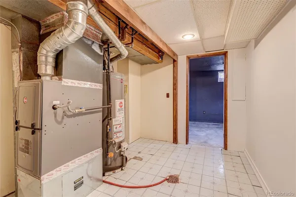 a bathroom with a sink a mirror and a toilet