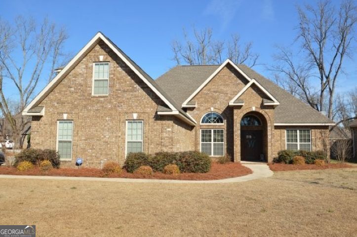 300 Grand Reserve Way Kathleen, GA 31047 - Photo 1 of 24 front view of a house with a yard