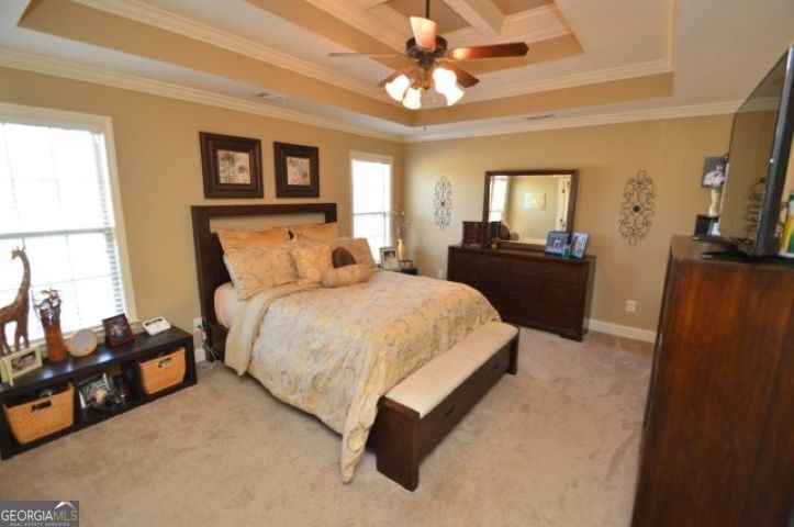 300 Grand Reserve Way Kathleen, GA 31047 - Photo 11 of 24 a bed room with a bed window and a television
