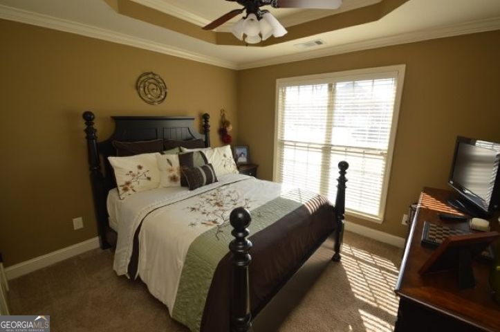 300 Grand Reserve Way Kathleen, GA 31047 - Photo 15 of 24 a bedroom with bed and window