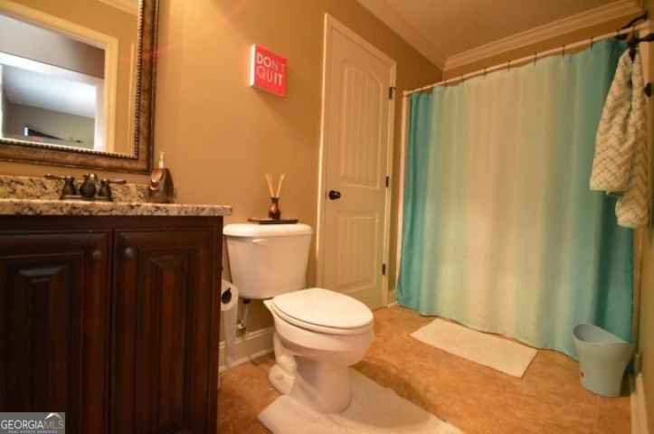 300 Grand Reserve Way Kathleen, GA 31047 - Photo 21 of 24 a bathroom with a granite countertop sink toilet and shower