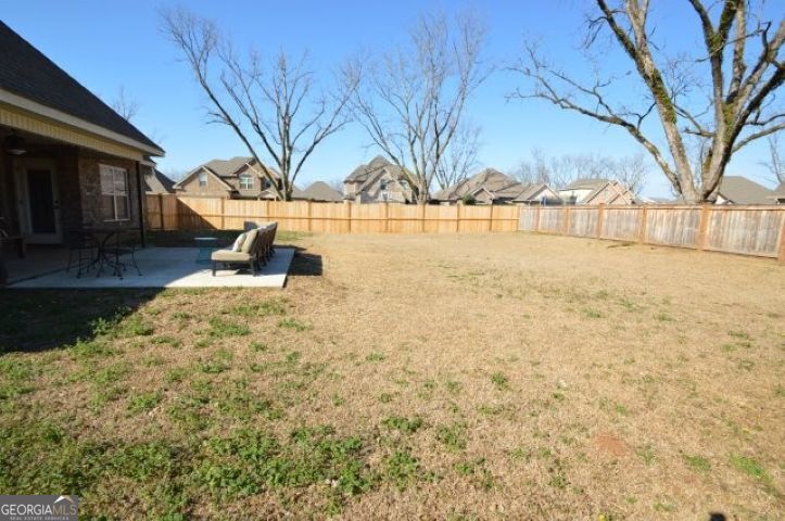 300 Grand Reserve Way Kathleen, GA 31047 - Photo 24 of 24 a building with trees in front of it