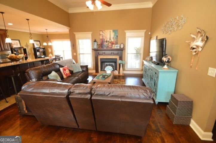 300 Grand Reserve Way Kathleen, GA 31047 - Photo 5 of 24 a living room with furniture and a fireplace