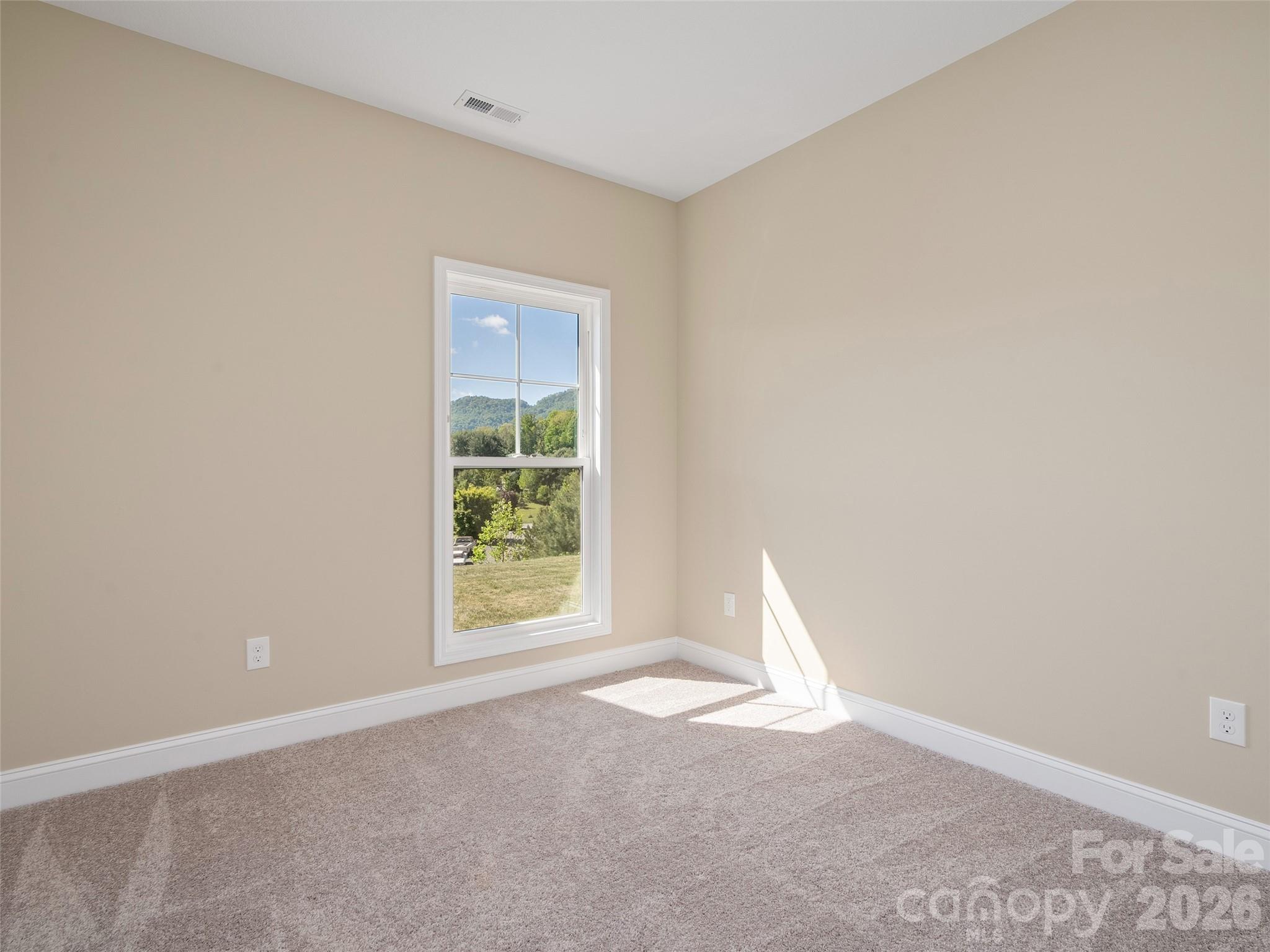 373 Barefoot Ridge Clyde, NC 28721 - Photo 25 of 30 an empty room with a window