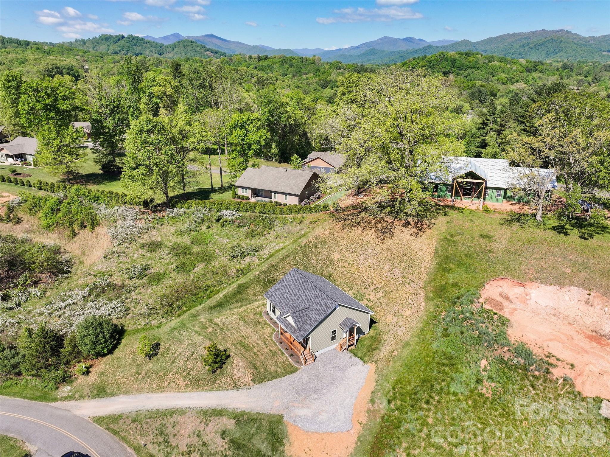 373 Barefoot Ridge Clyde, NC 28721 - Photo 30 of 30 an aerial view of residential houses with outdoor space