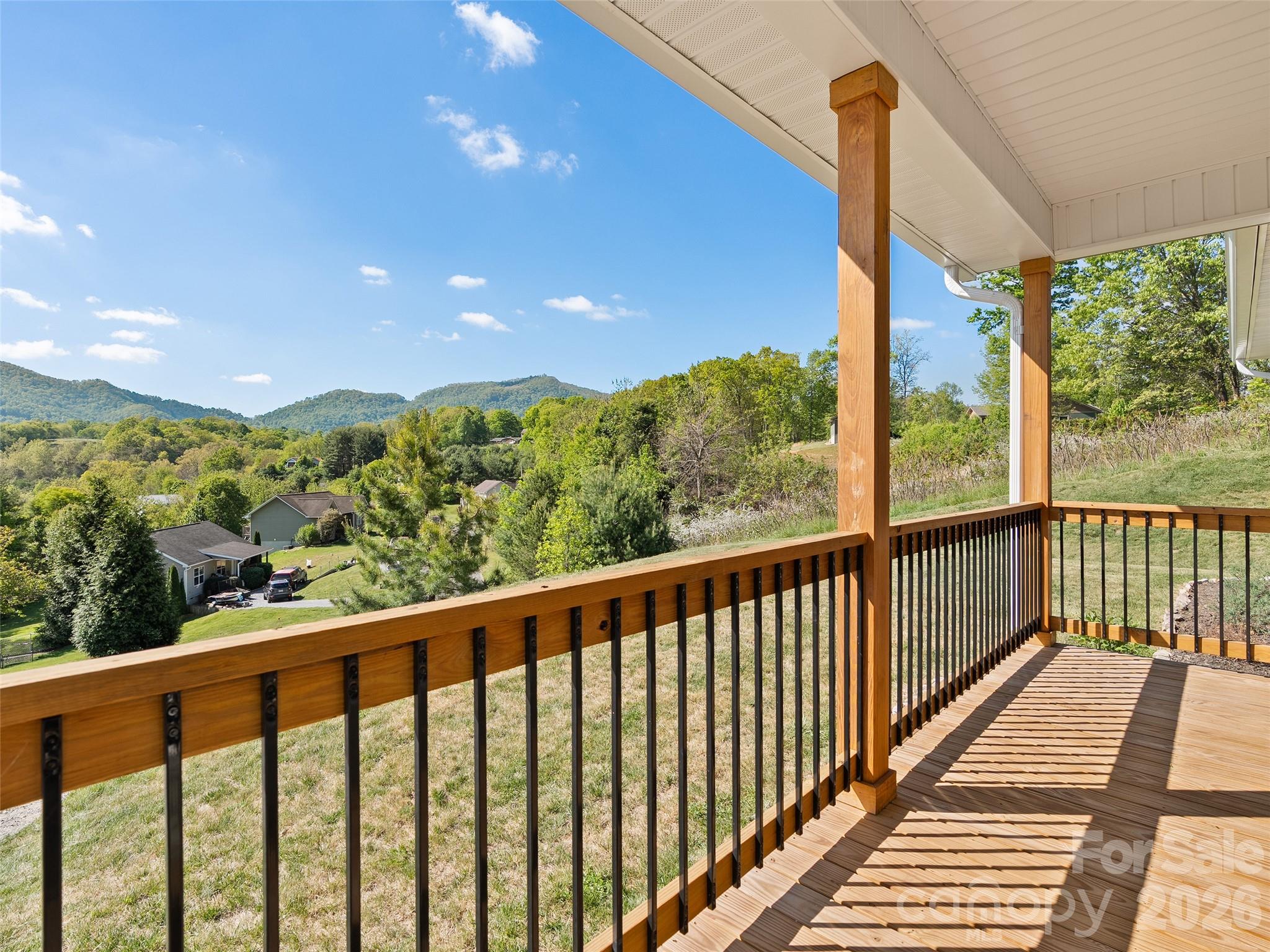 373 Barefoot Ridge Clyde, NC 28721 - Photo 8 of 30 a view of city with balcony