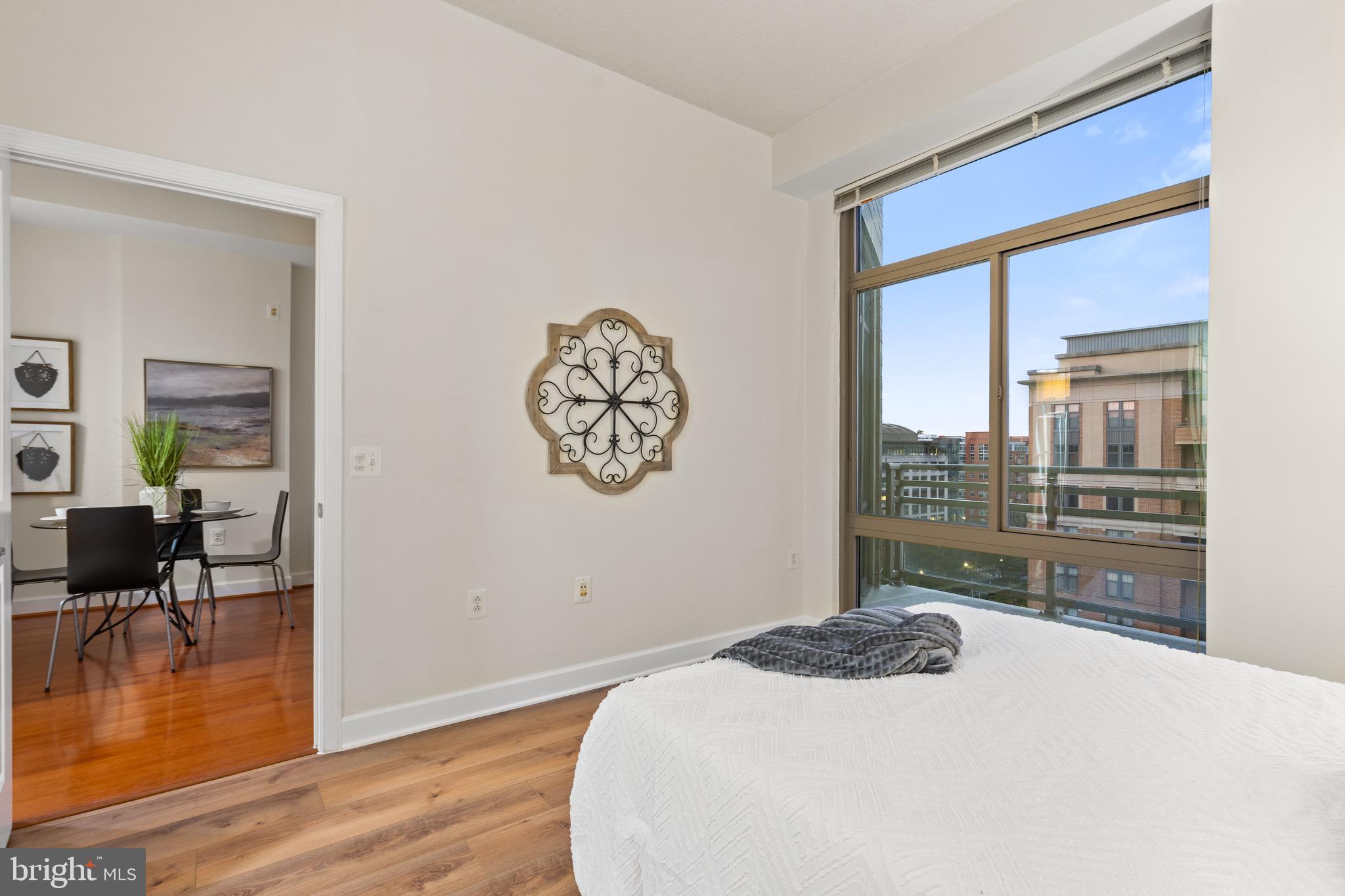 3650 South Glebe Road, Unit 1147 Arlington, VA 22202 - Photo 11 of 51 a bedroom with a bed and a window