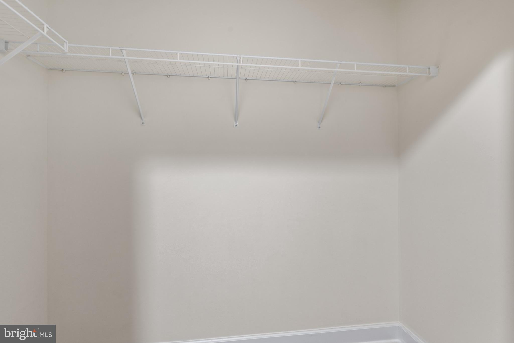 3650 South Glebe Road, Unit 1147 Arlington, VA 22202 - Photo 15 of 51 a view of a room with racks on the wall