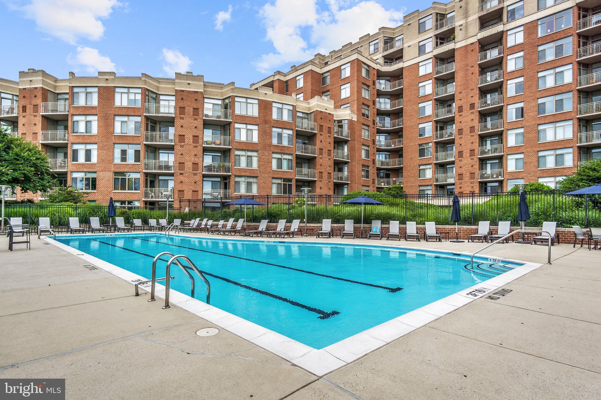3650 South Glebe Road, Unit 1147 Arlington, VA 22202 - Photo 48 of 51 a large building with a swimming pool