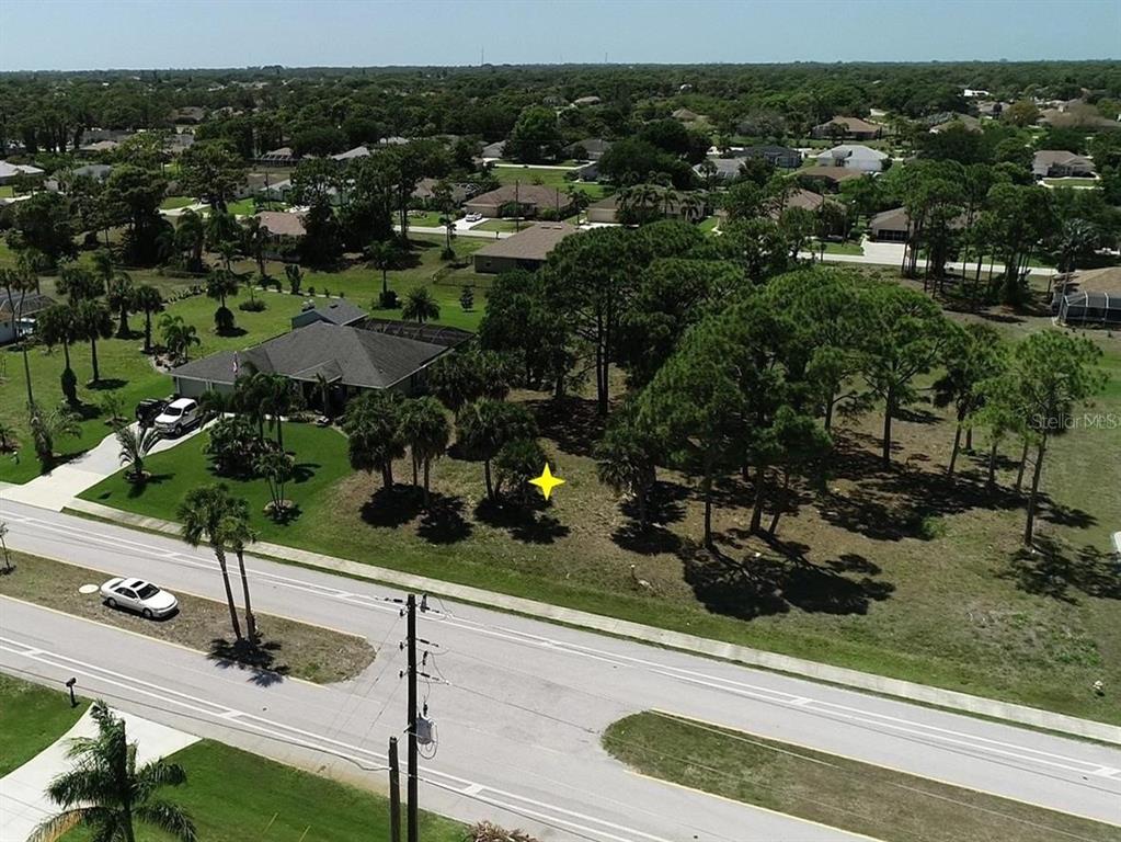 281 Rotonda Boulevard North Rotonda West, FL 33947 - Photo 3 of 5 a view of a garden
