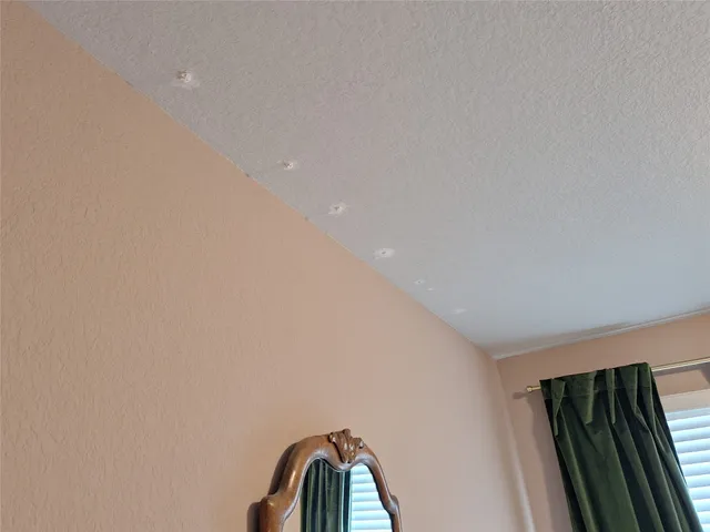 a view of a hallway with staircase