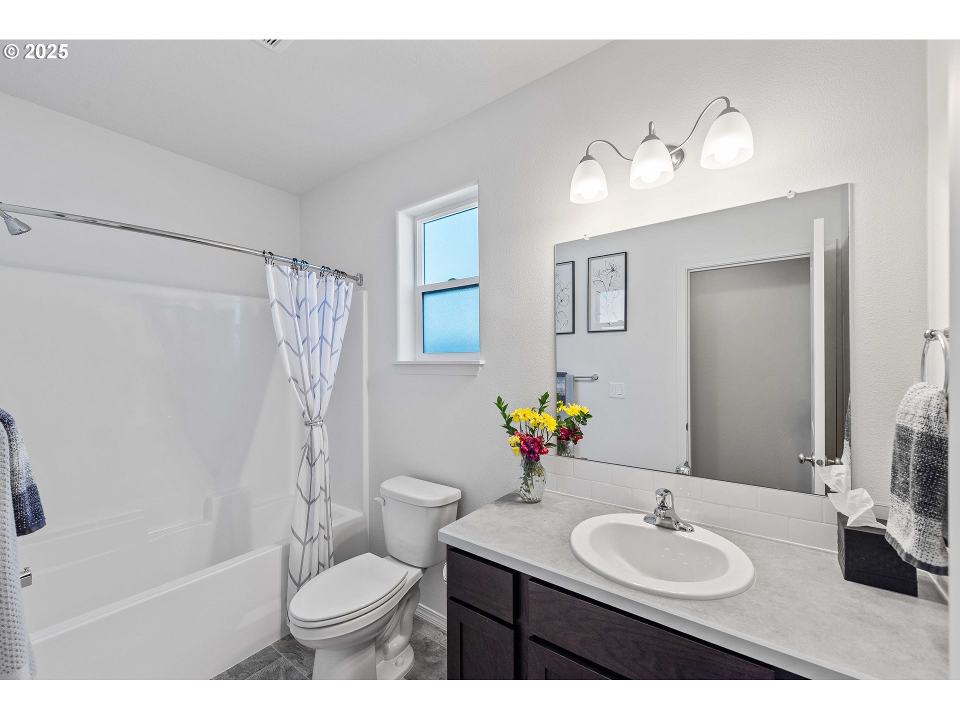 764 Seacrest Drive Bandon, OR 97411 - Photo 13 of 43 a bathroom with a sink toilet tub and shower