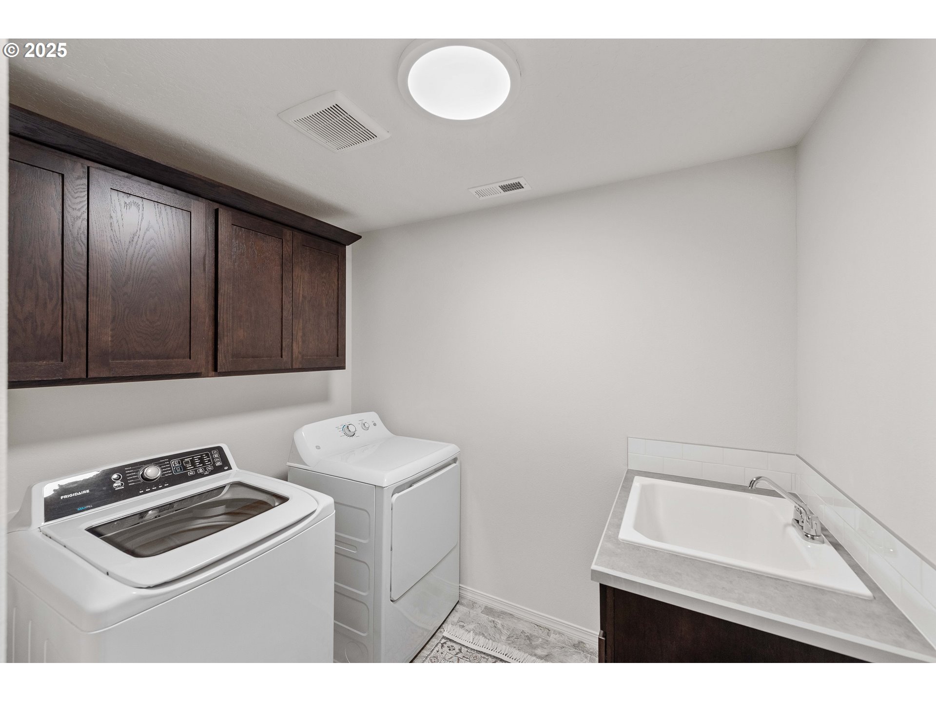 764 Seacrest Drive Bandon, OR 97411 - Photo 21 of 43 a utility room with dryer and washer