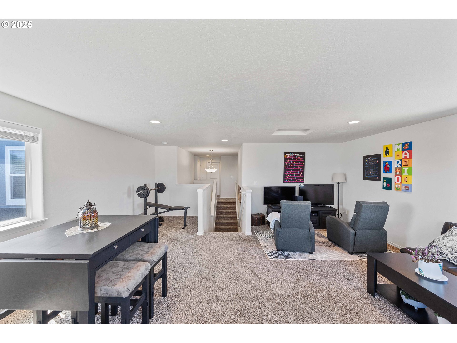 764 Seacrest Drive Bandon, OR 97411 - Photo 29 of 43 a living room with furniture and a wooden floor