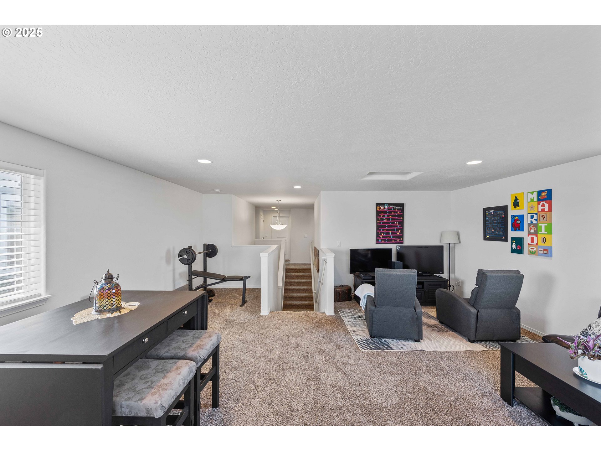 764 Seacrest Drive Bandon, OR 97411 - Photo 34 of 43 a living room with furniture and a flat screen tv