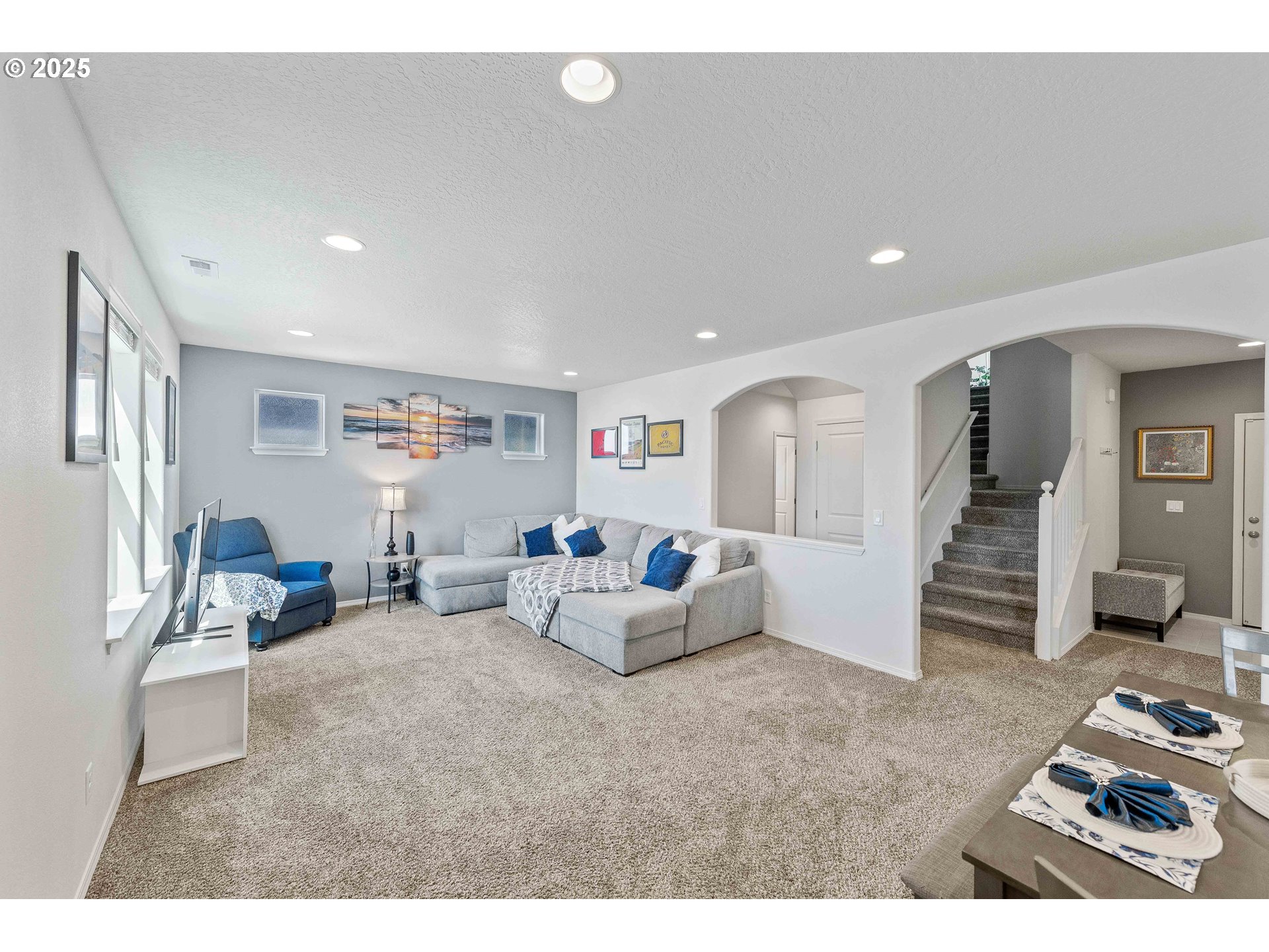 764 Seacrest Drive Bandon, OR 97411 - Photo 5 of 43 a living room with furniture and wooden floor