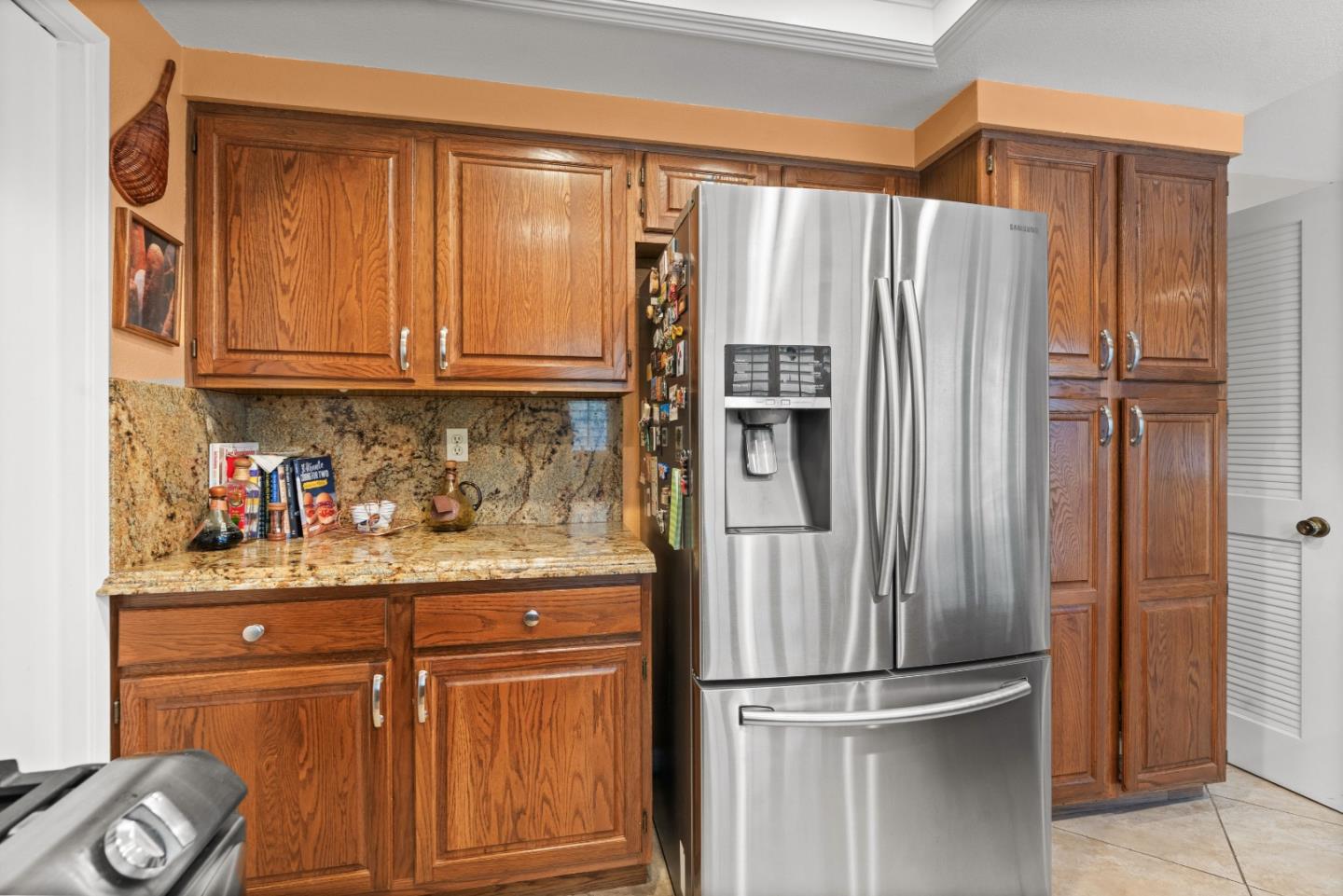 3040 Cedar Ridge Court San Jose, CA 95148 - Photo 19 of 40 a kitchen with stainless steel appliances granite countertop a refrigerator and a sink