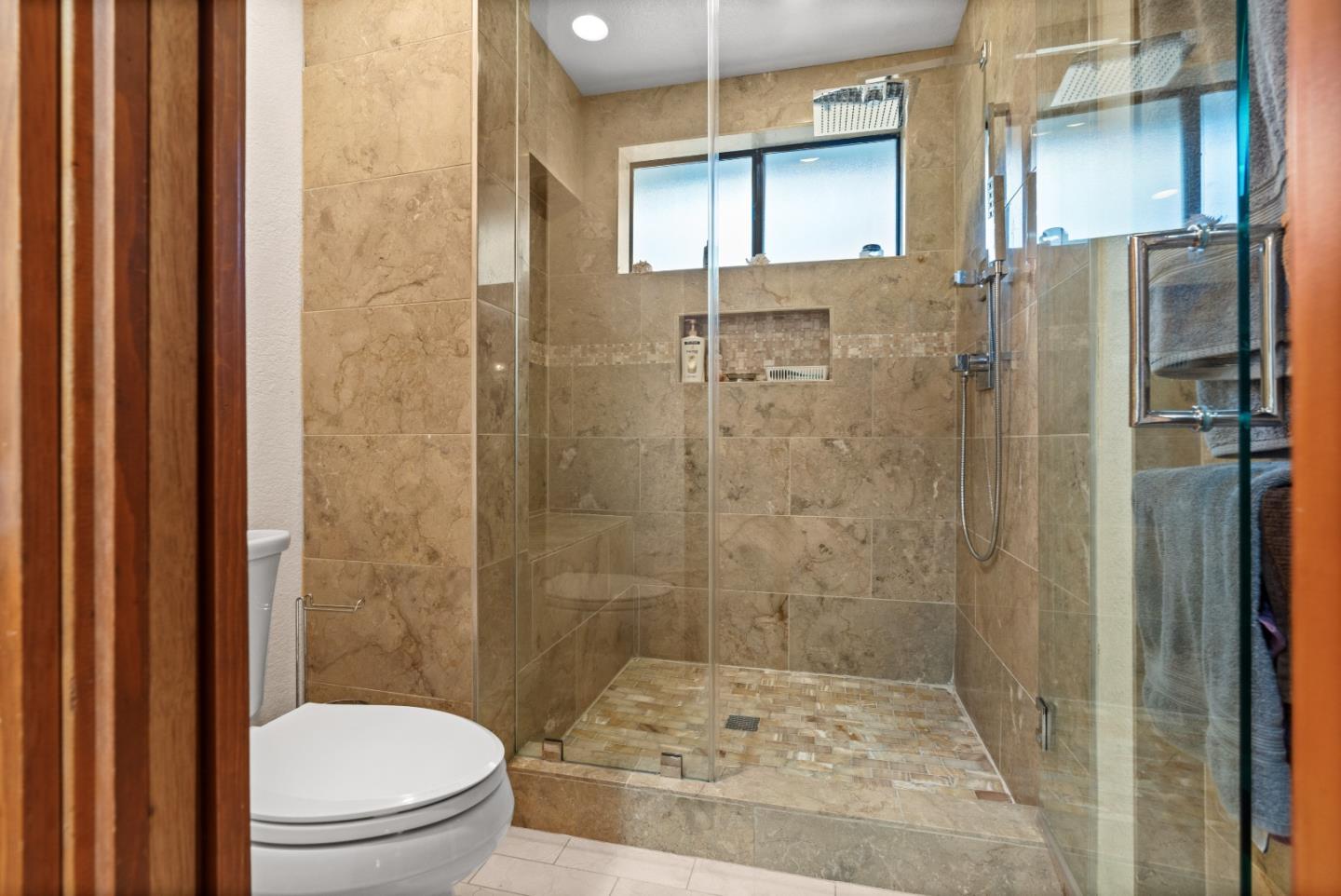 3040 Cedar Ridge Court San Jose, CA 95148 - Photo 24 of 40 a bathroom with a shower and a toilet
