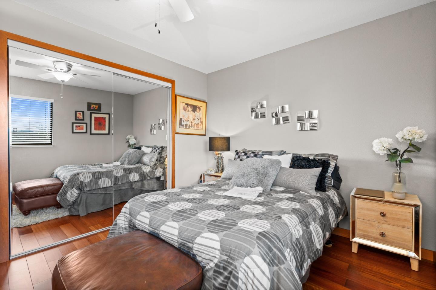 3040 Cedar Ridge Court San Jose, CA 95148 - Photo 30 of 40 a bedroom with a bed and wooden floor