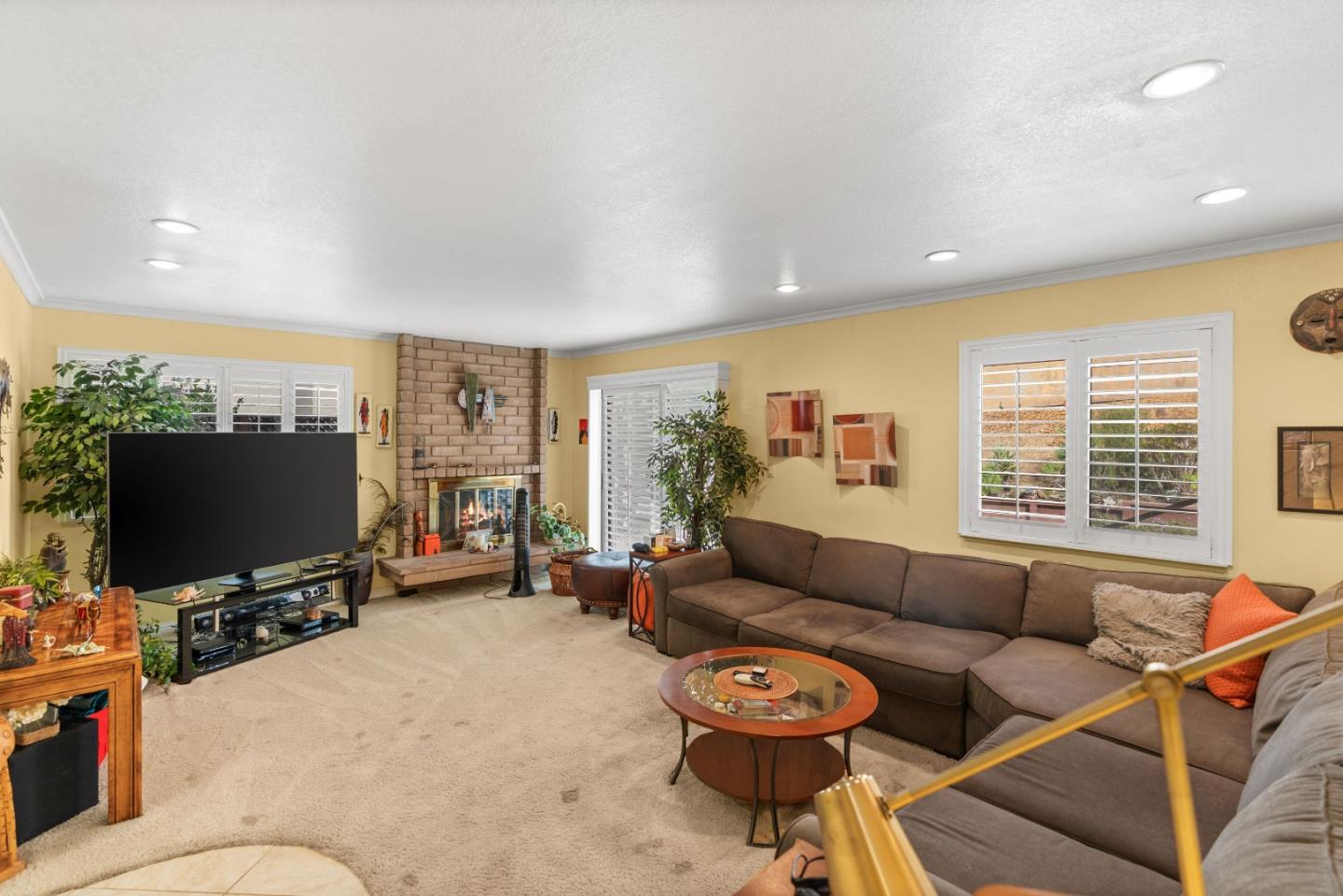 3040 Cedar Ridge Court San Jose, CA 95148 - Photo 34 of 40 a living room with furniture and a flat screen tv