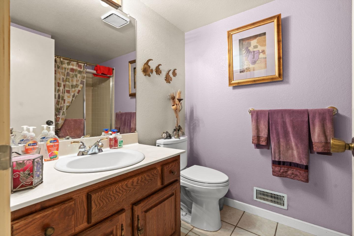 3040 Cedar Ridge Court San Jose, CA 95148 - Photo 37 of 40 a bathroom with a sink vanity mirror and toilet