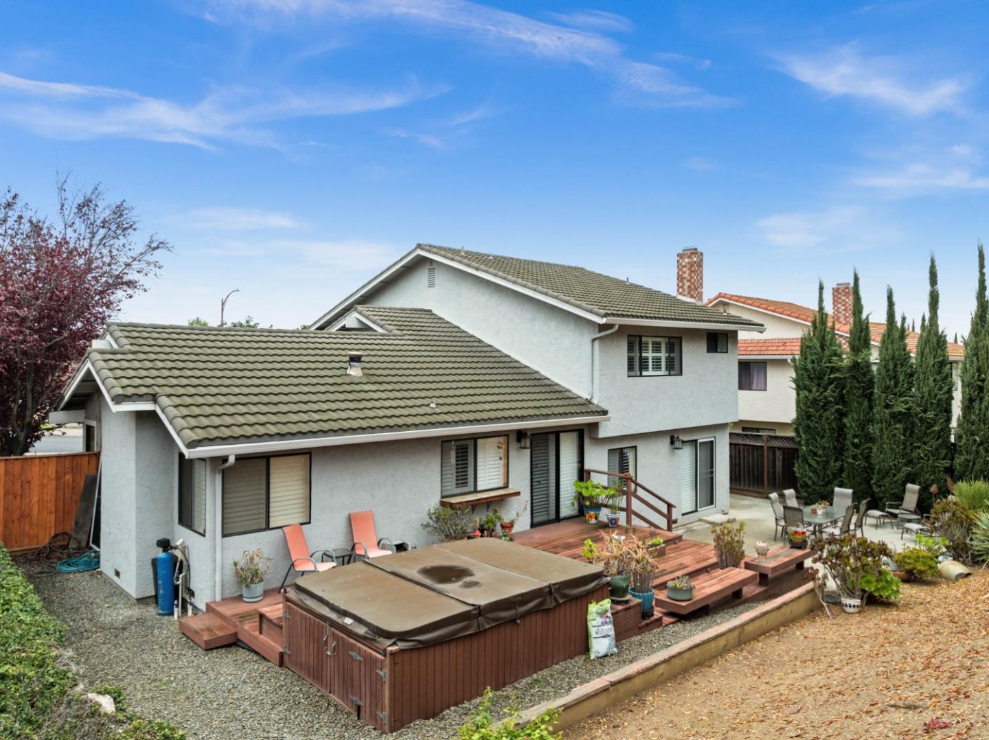 3040 Cedar Ridge Court San Jose, CA 95148 - Photo 4 of 40 a front view of a house with garage