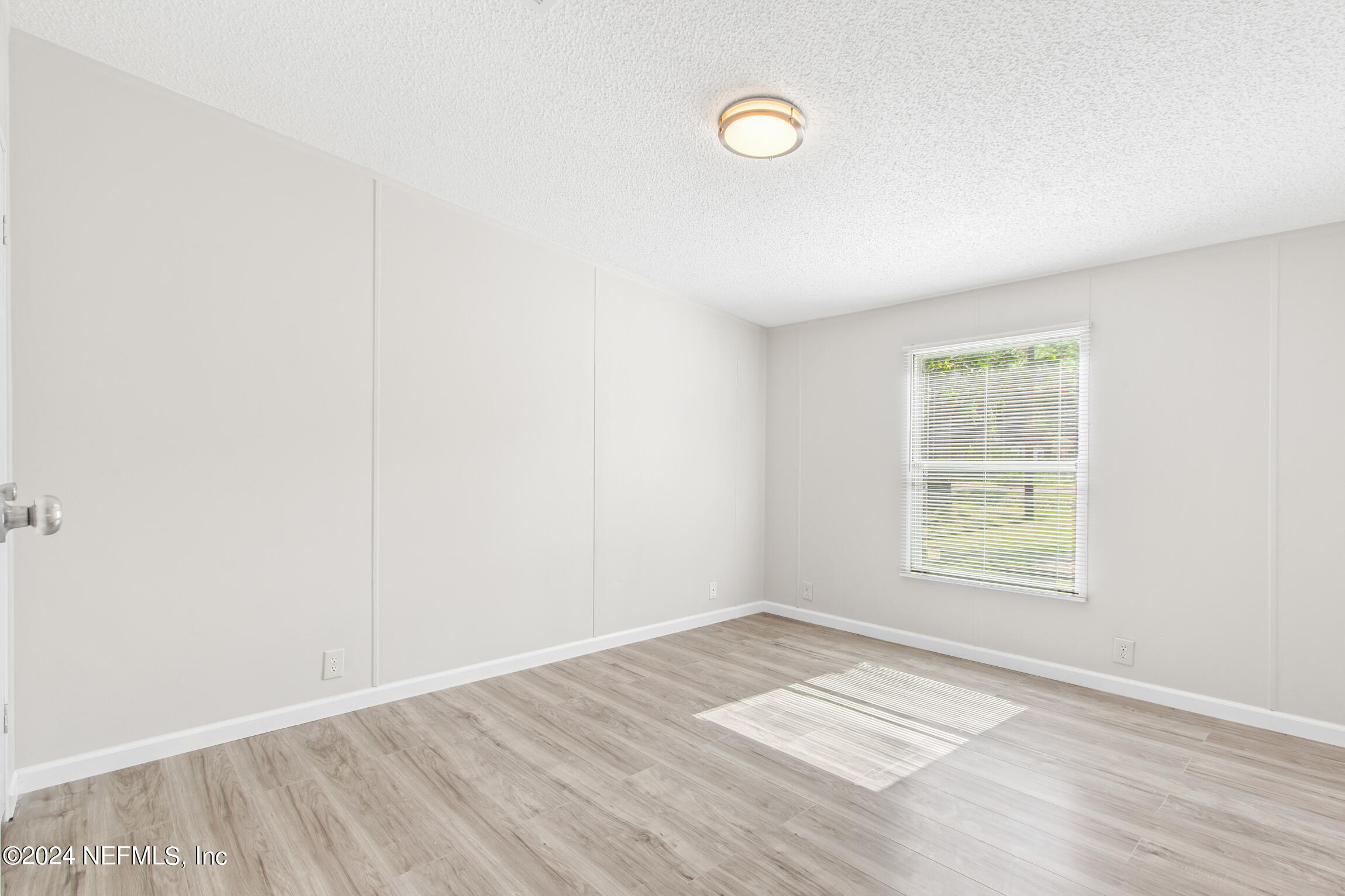 1650 Natalie Road St. Augustine, FL 32084 - Photo 22 of 44 an empty room with a window