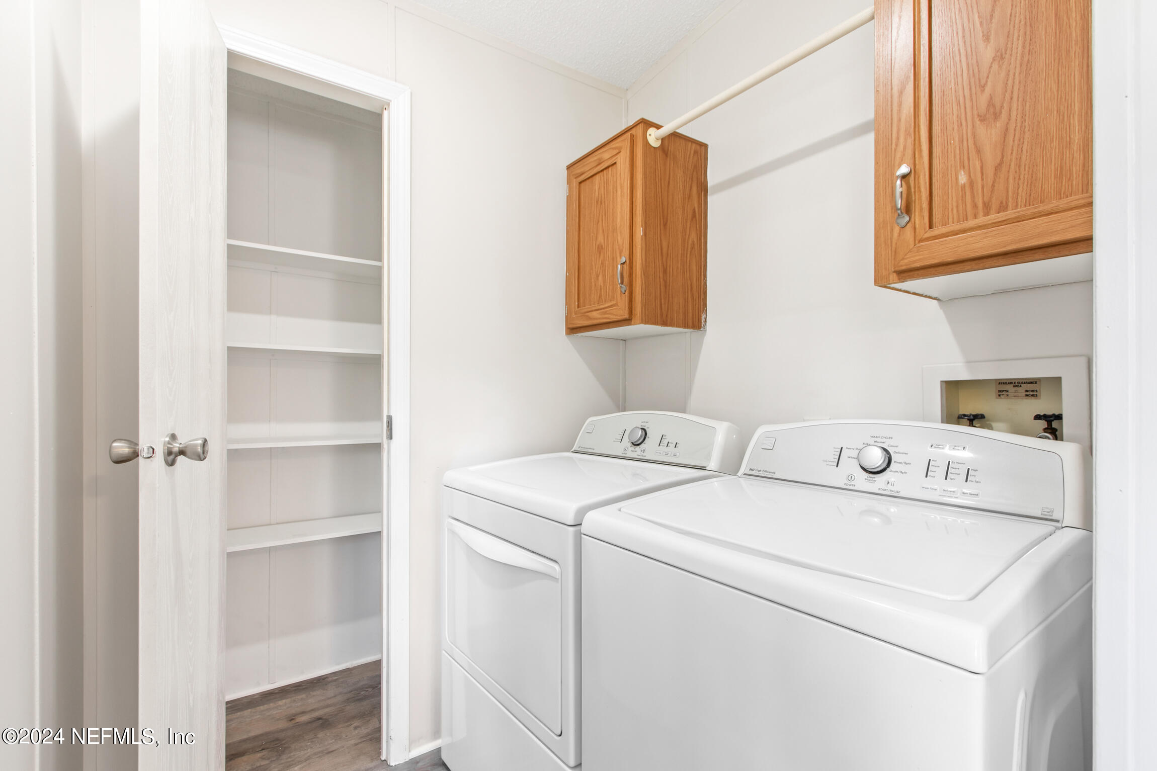 1650 Natalie Road St. Augustine, FL 32084 - Photo 25 of 44 a utility room with dryer and washer