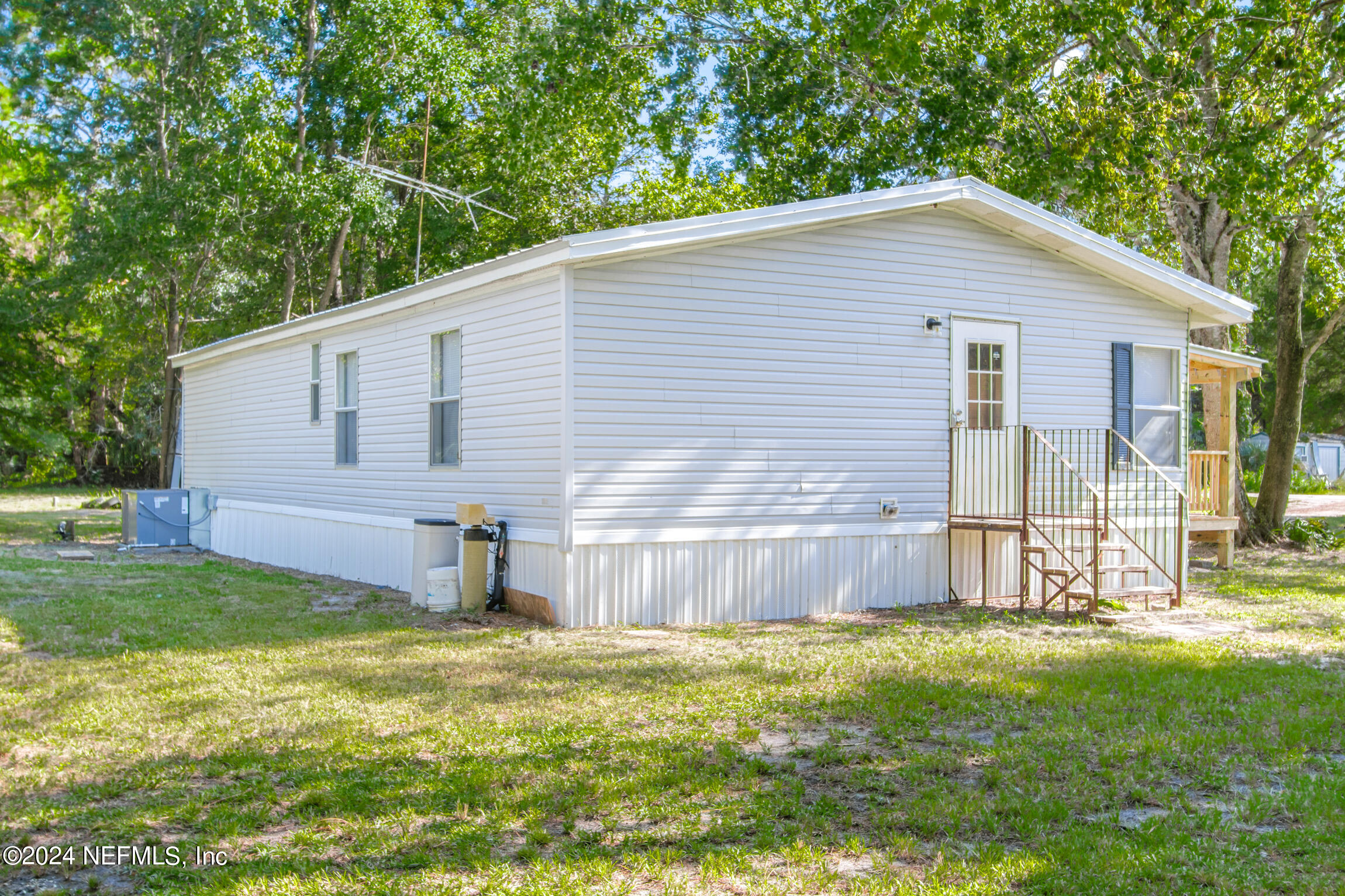 1650 Natalie Road St. Augustine, FL 32084 - Photo 28 of 44 a view of a backyard with a garden and entertaining space