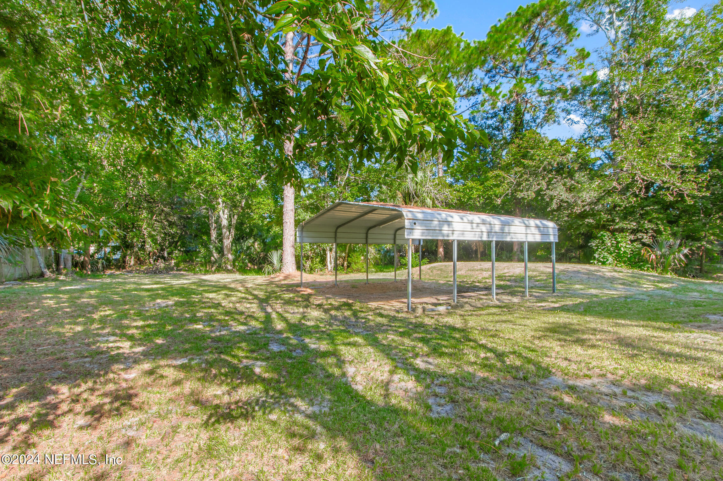 1650 Natalie Road St. Augustine, FL 32084 - Photo 30 of 44 a view of a house with a yard