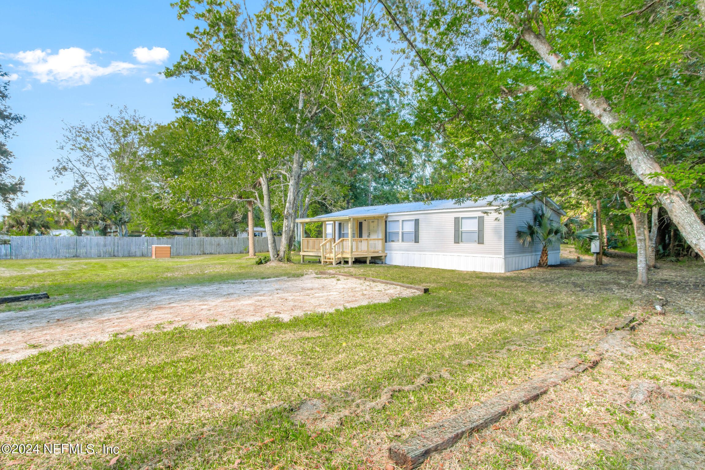 1650 Natalie Road St. Augustine, FL 32084 - Photo 33 of 44 a view of a house with backyard and tree