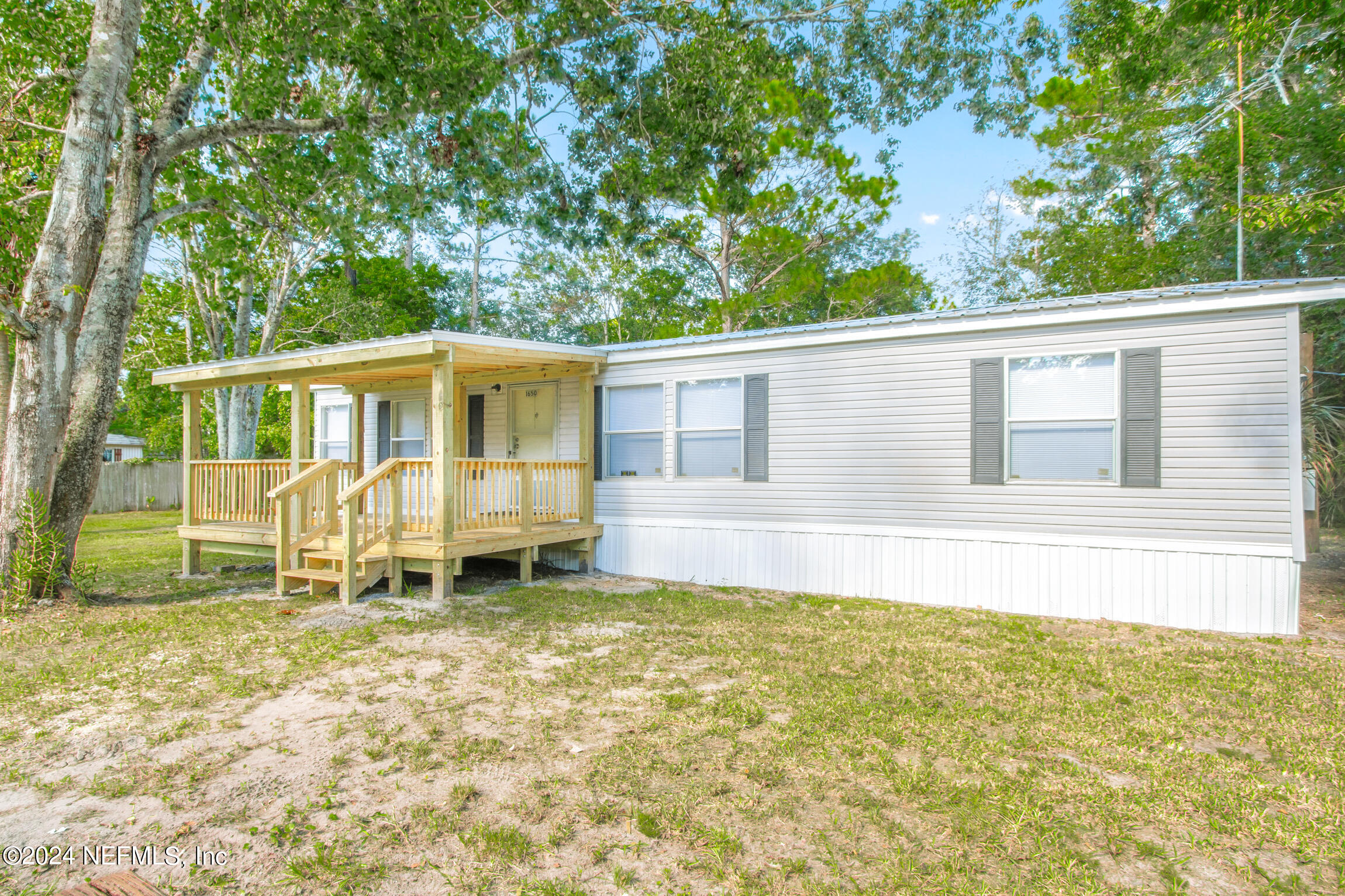 1650 Natalie Road St. Augustine, FL 32084 - Photo 34 of 44 a house view with a garden space