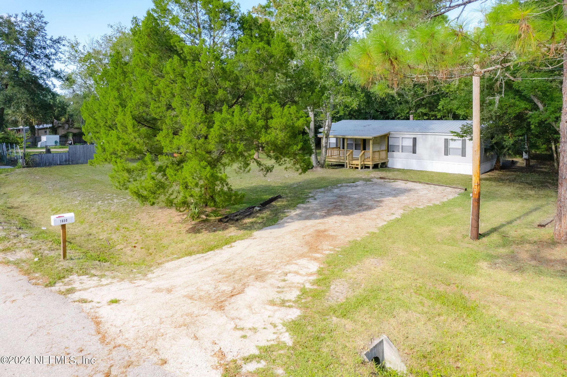 1650 Natalie Road St. Augustine, FL 32084 - Photo 37 of 44 a view of a house with basketball court