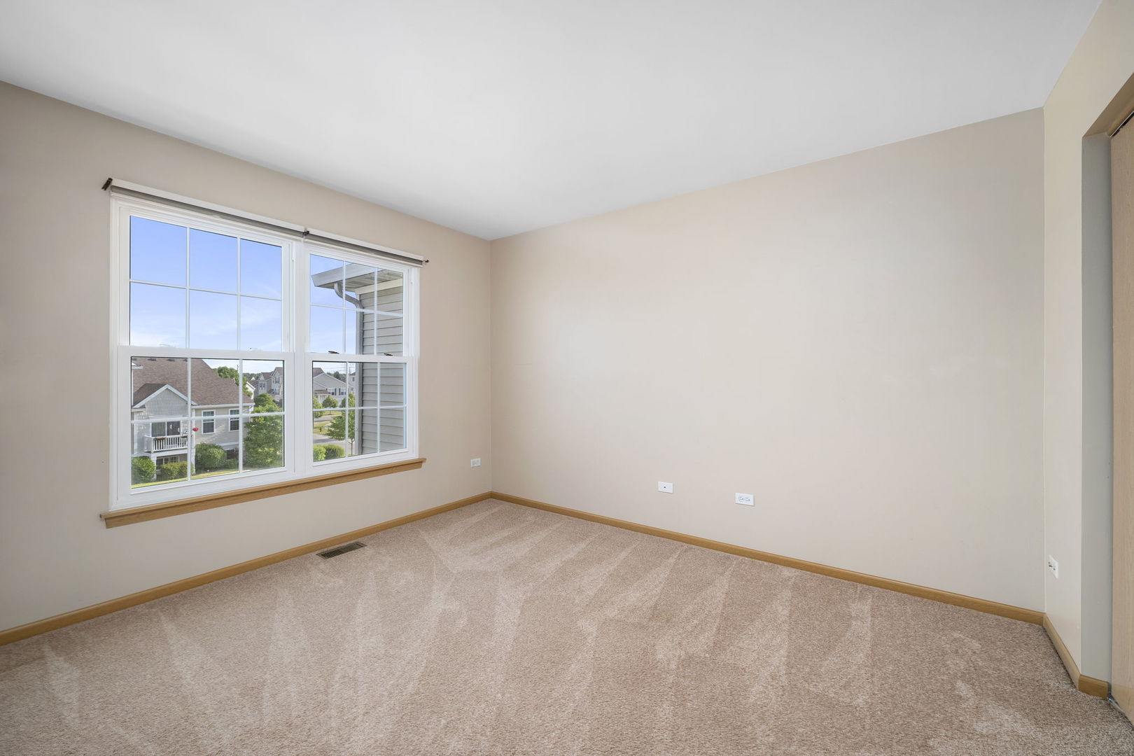 1784 Fieldstone Drive North Shorewood, IL 60404 - Photo 15 of 24 an empty room with a window