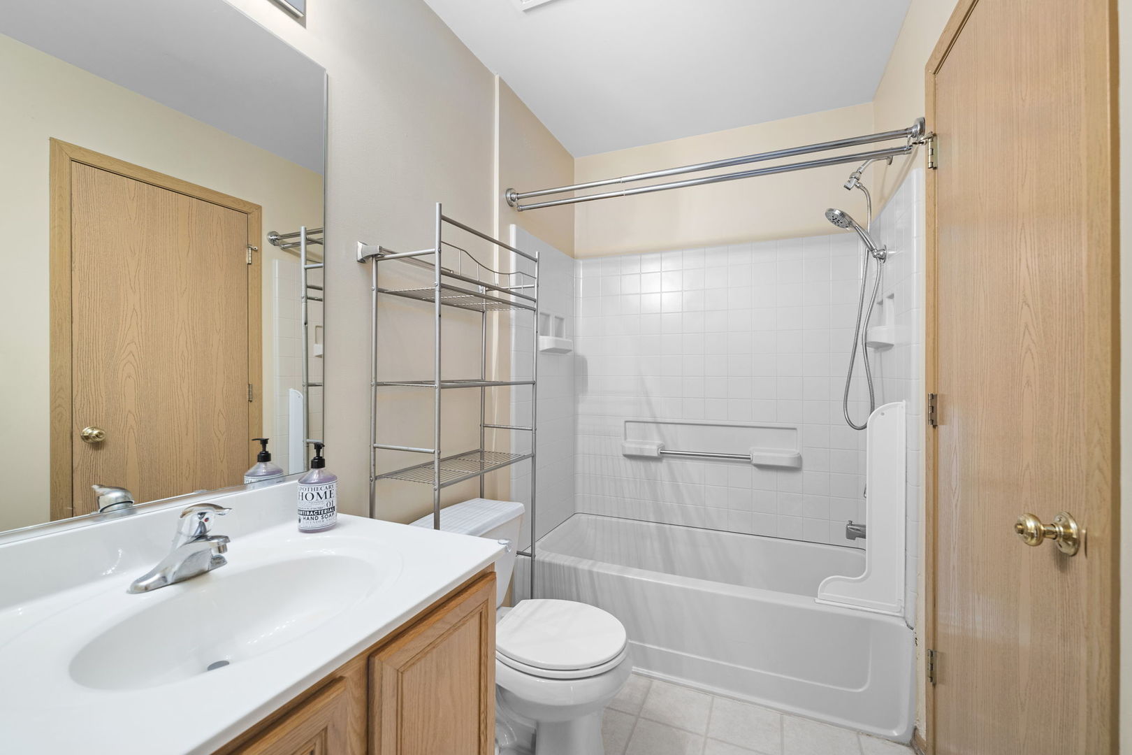 1784 Fieldstone Drive North Shorewood, IL 60404 - Photo 18 of 24 a bathroom with a sink a toilet and shower